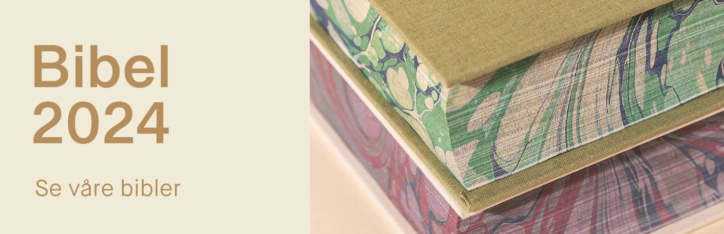 Bibel 2024, kjøp her. Nærbilde av marmorerte bibelsider